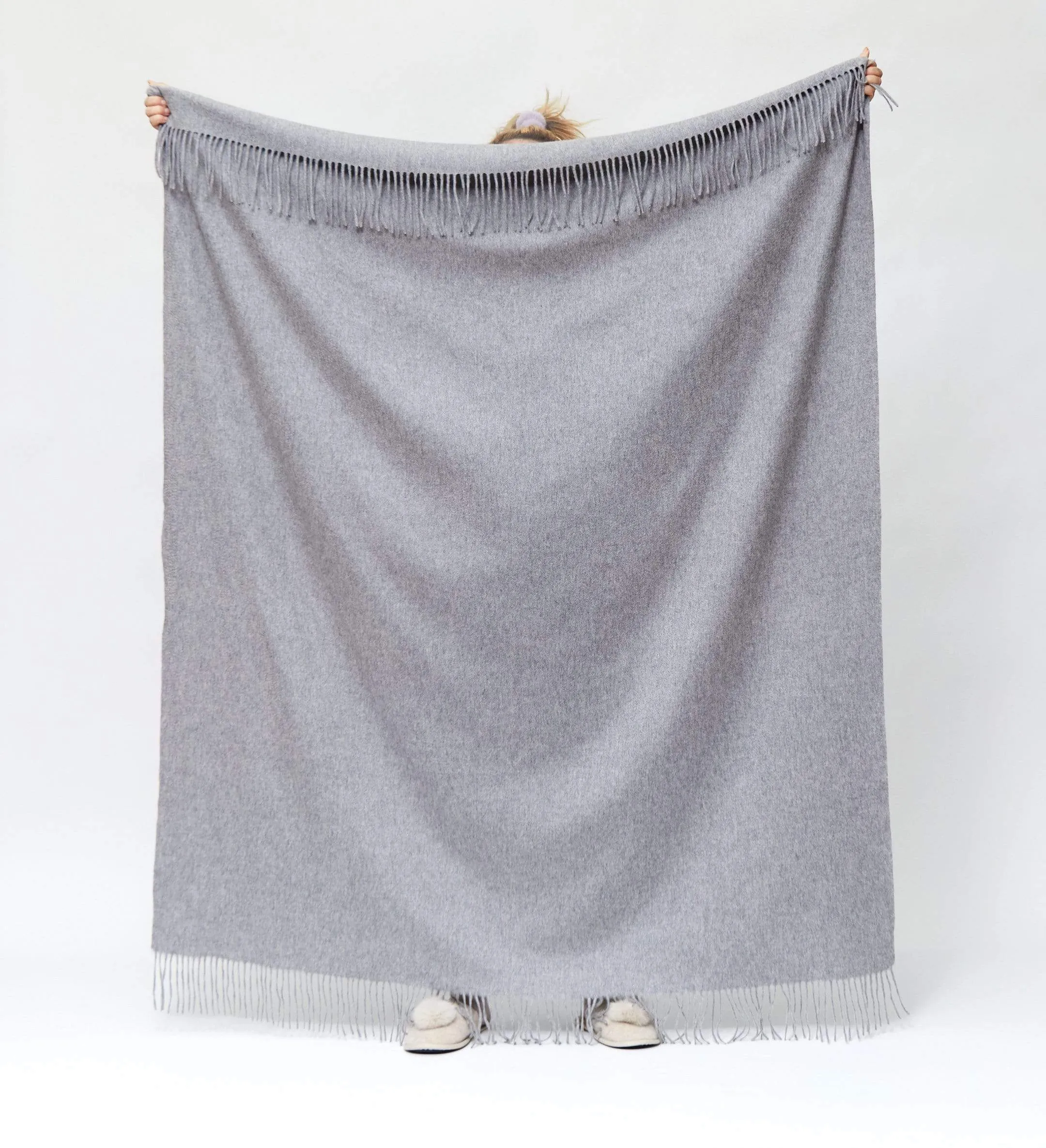 The Solid Cashmere Fringe Throw Blanket