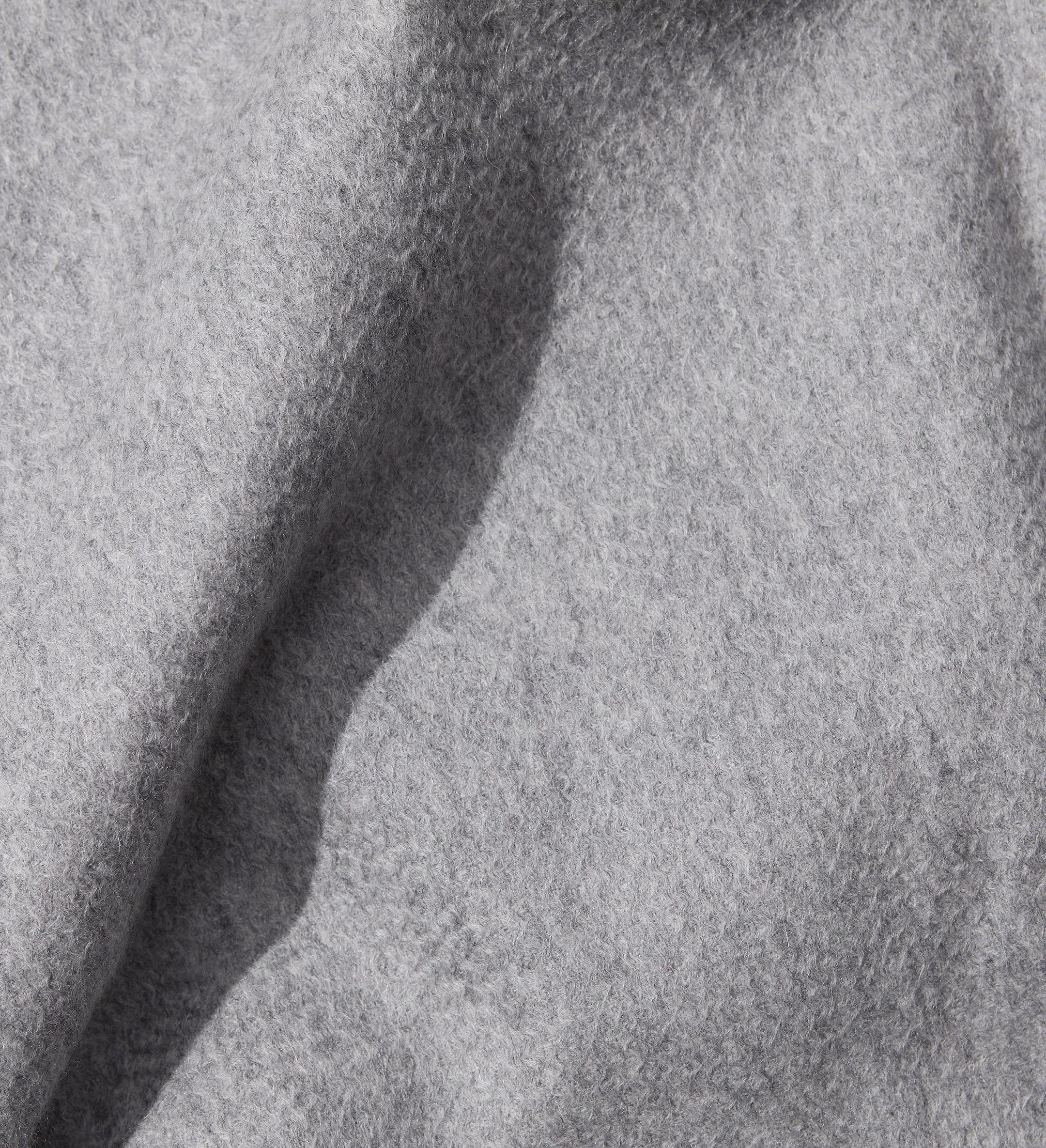 The Solid Cashmere Fringe Throw Blanket