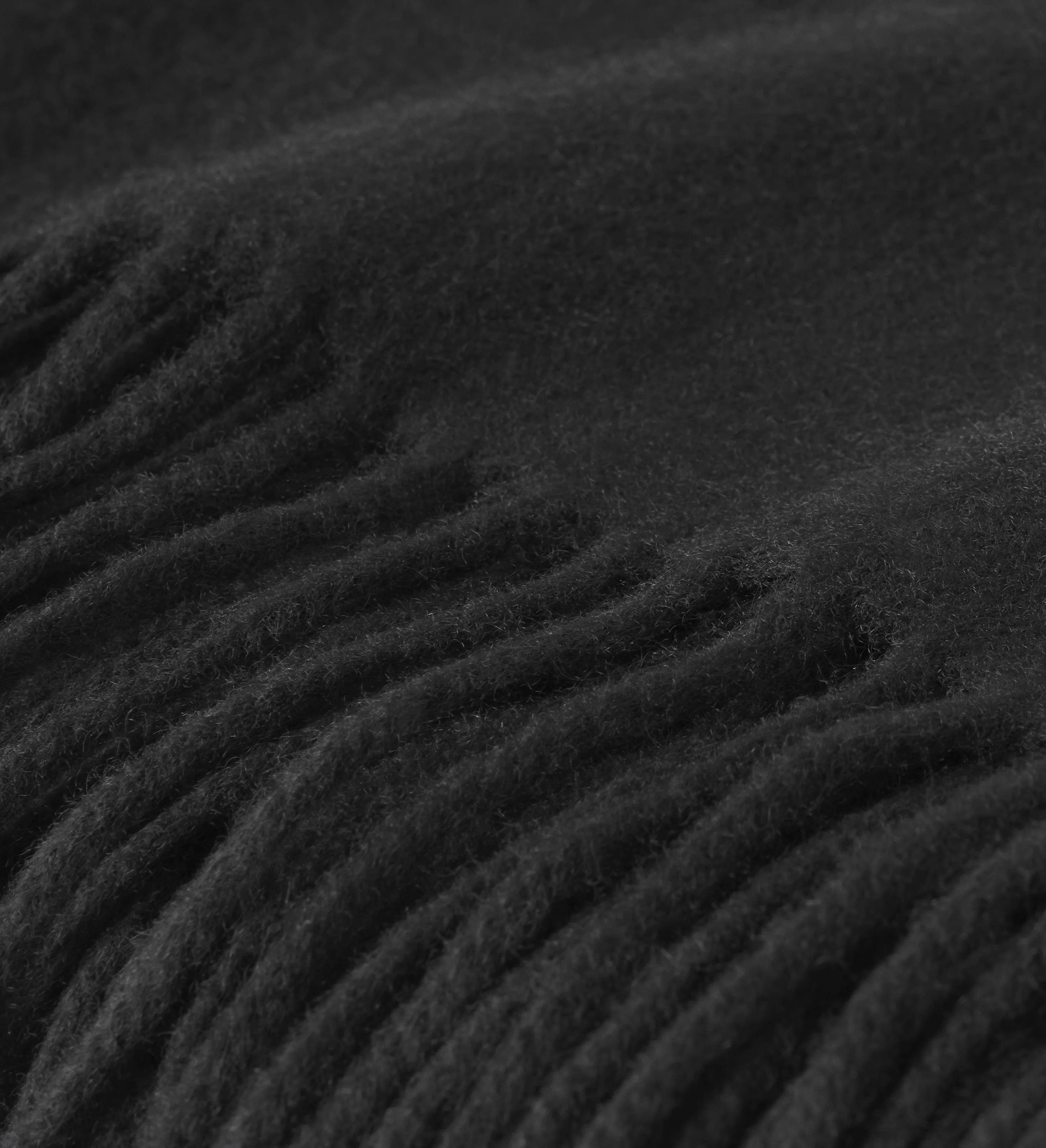The Solid Cashmere Fringe Throw Blanket