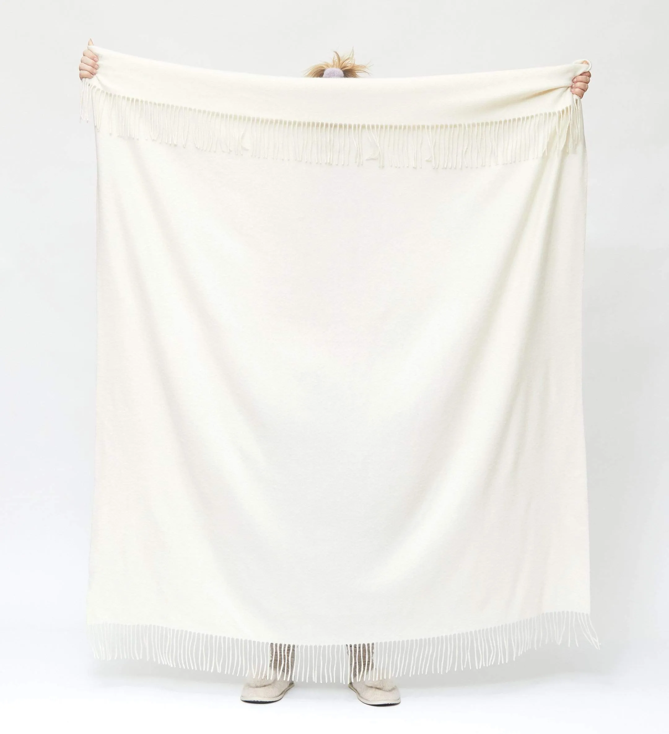 The Solid Cashmere Fringe Throw Blanket